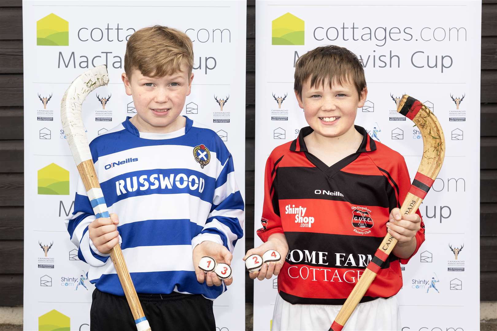 Making the draw were Lewis MacKintosh from Newtonmore Primary School and Alfie MacLeod, of Glenurquhart Primary School. Lewis’s father, Glen, and Alfie's father Iain are both previous winners of the MacTavish Cup.
