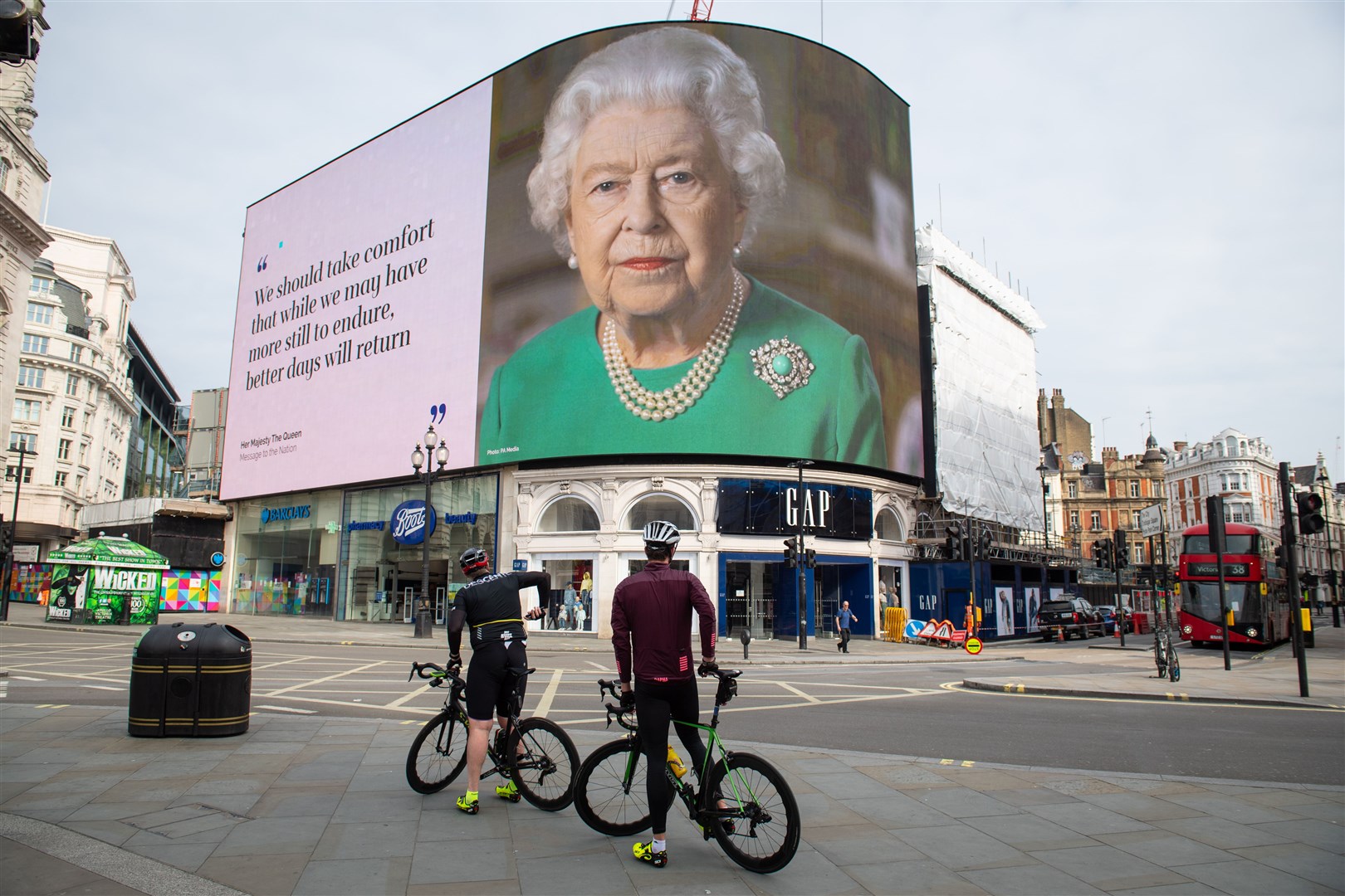The Queen’s broadcast to the UK displayed in London’s Piccadilly Circus