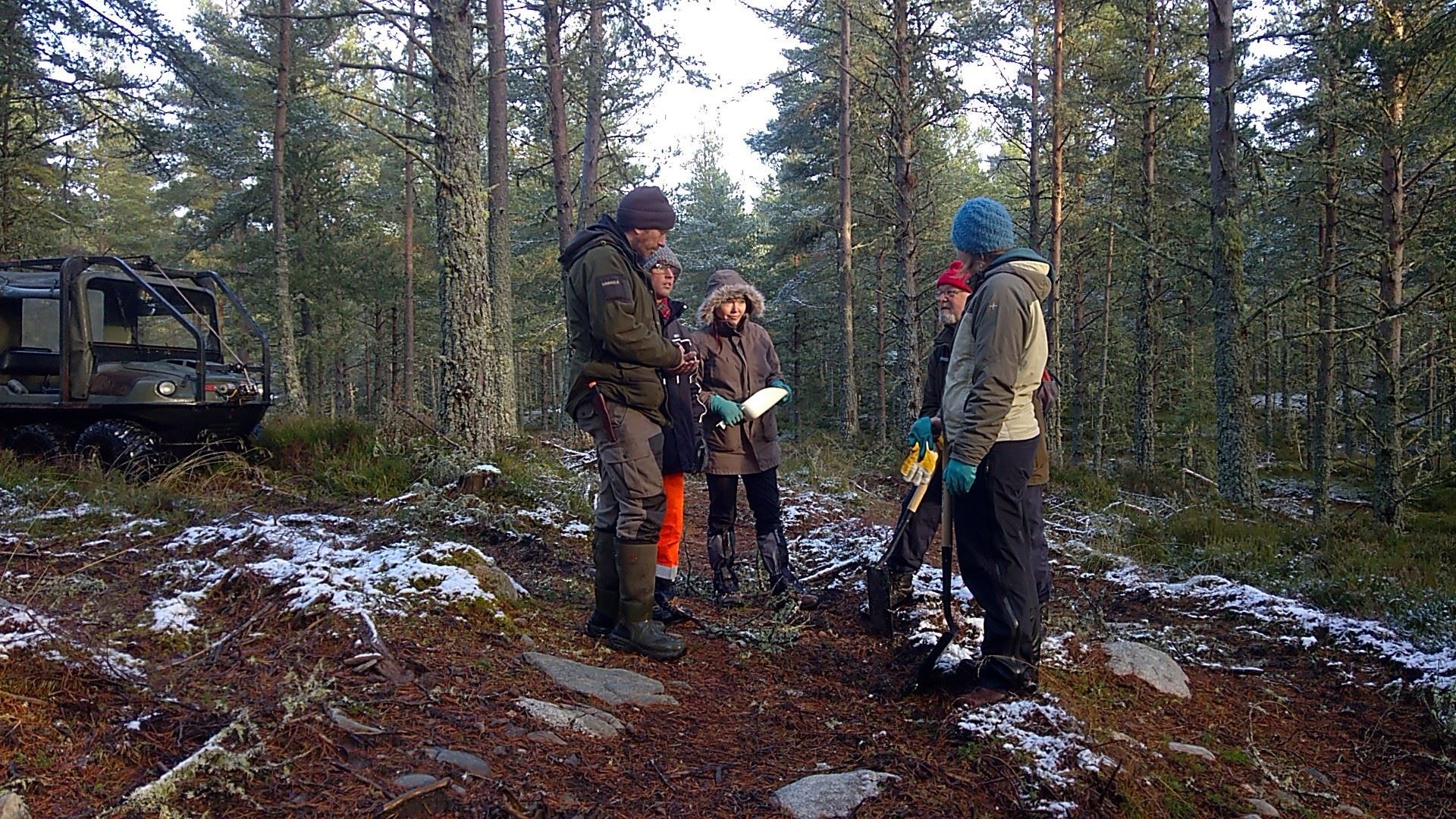 Gamekeeper Ewan Archer with a local capercaillie crew in Deshar Wood