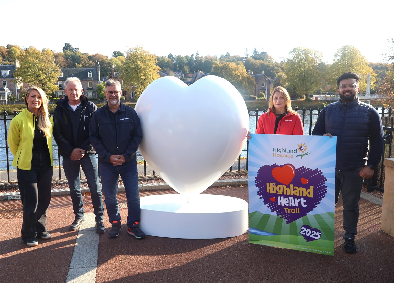 Karen Duff from Highland Hospice, alongside Norpower's Alistair Macleod, Tony Delaney, Jenn Macleod and Choudhry Virk.