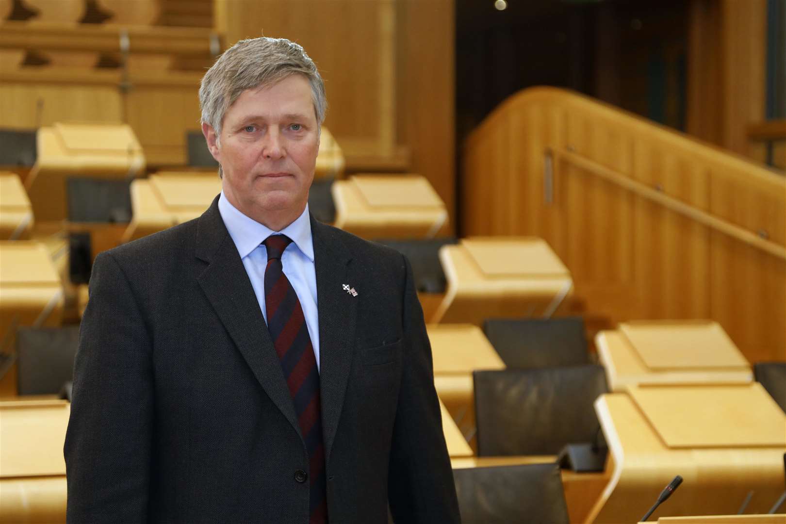 Edward Mountain MSP pictured in the chamber of the Scottish parliament.