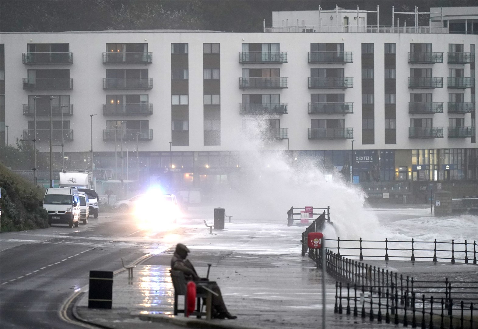 Waves crash near the ‘Freddie Gilroy’ sculpture by artist Ray Lonsdale in Scarborough, as Storm Babet batters the country (Danny Lawson/PA)
