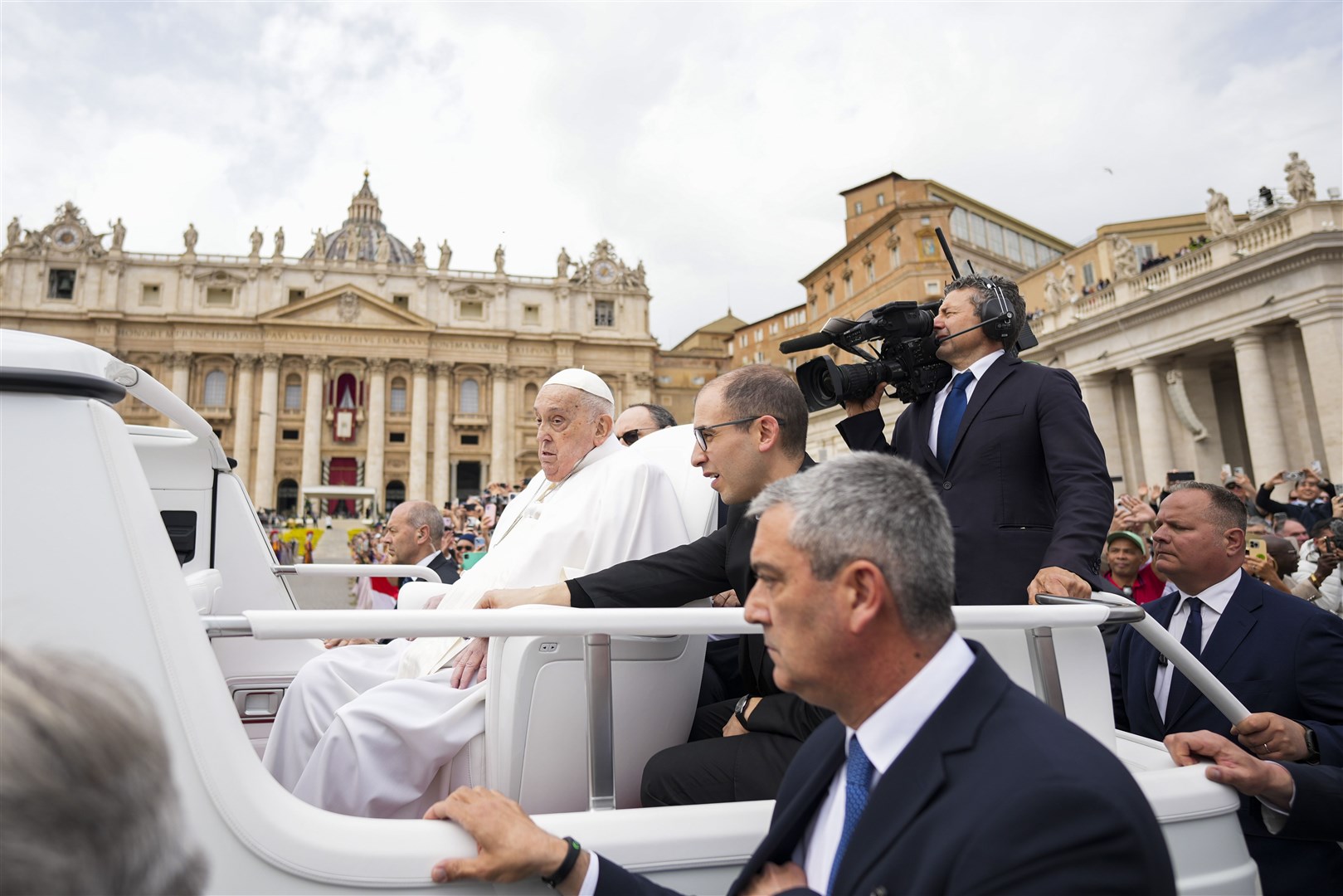 Pope Francis tours St Peter’s Square in his popemobile after his balcony appearance at the end of the Easter Sunday mass (Andrew Medichini/AP)