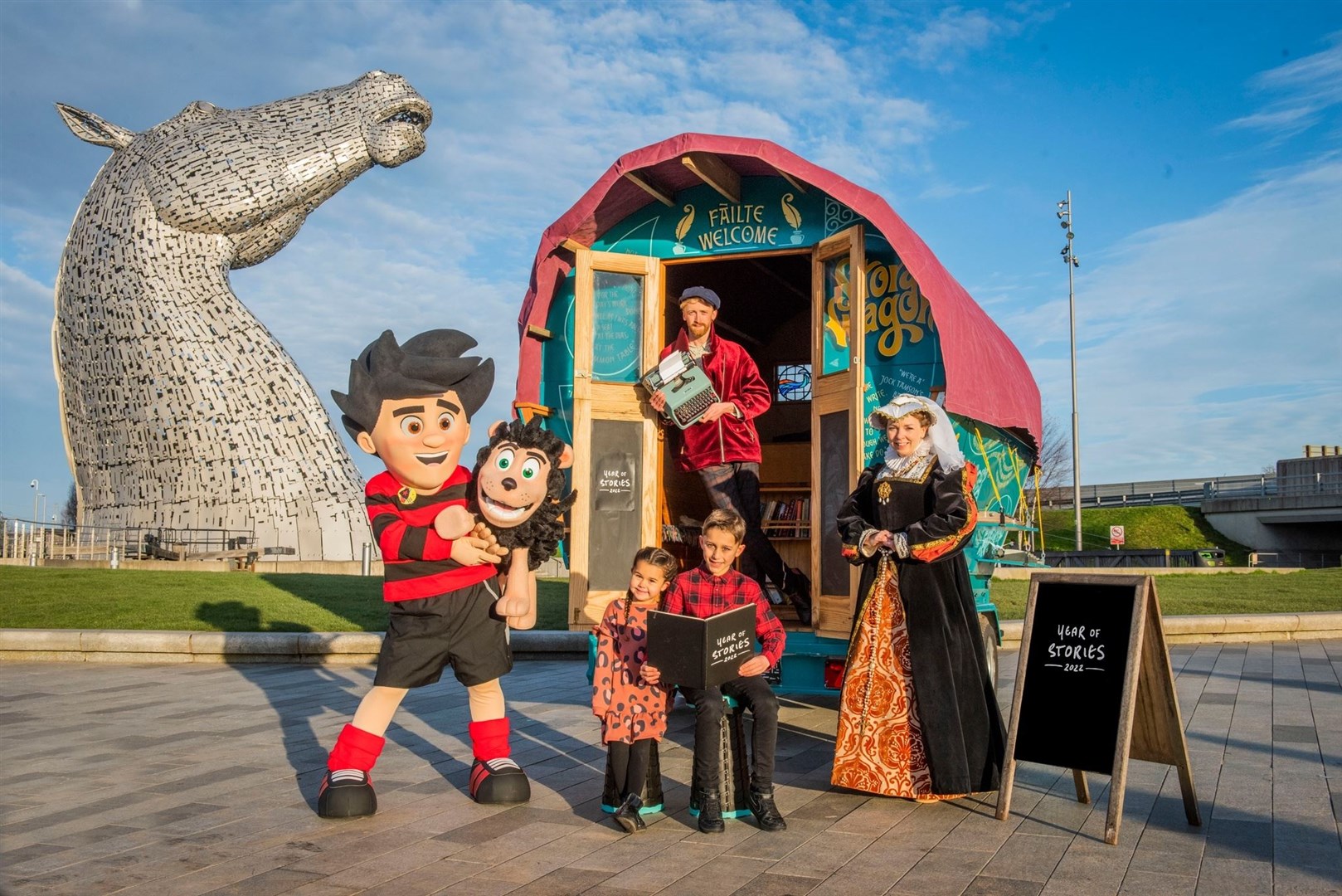 Scotland’s Year of Stories 2022 was launched with Scottish story icons Dennis the Menace and Mary, Queen of Scots sharing their tales with Luke Winter of the Story Wagon. They were joined by Rocco Cesari, eight and Francesca Cesari, five at The Kelpies in Falkirk Picture: VisitScotland/Chris Watt