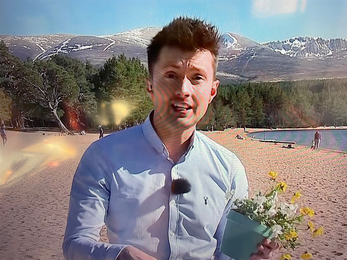 Sean Batty presented the weather this evening rom a sun-bathed Loch Morlich.