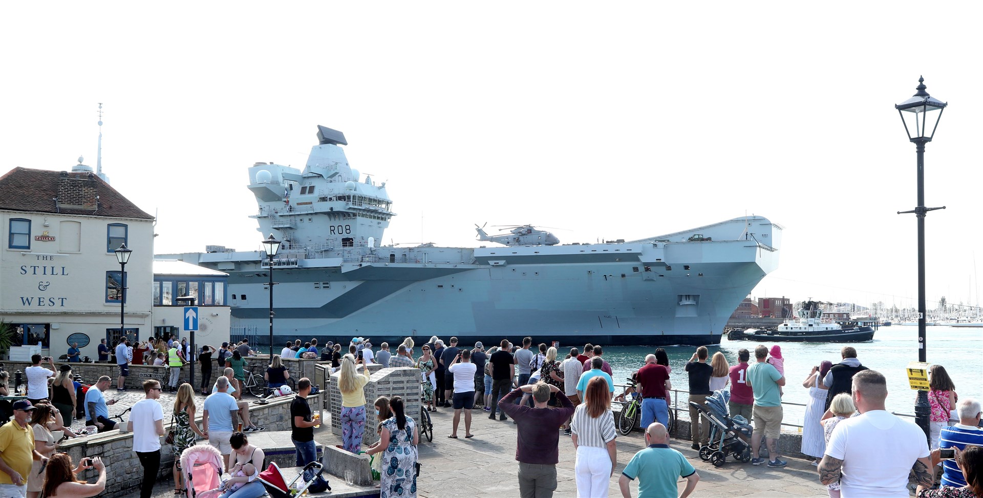 HMS Queen Elizabeth arrived back at Portsmouth Naval Base on Sunday (Gareth Fuller/PA)