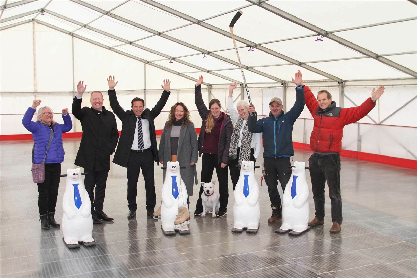 Celebrating a great achievement are Janis Bootle, Iain Miller, Duncan Swarbrick, Lee Bissett, Amanda Clinton, Kirsty Bruce, Mike Gale and Mike Dearman. Now is it up to residents in the strath and visitors to support the ice rink.