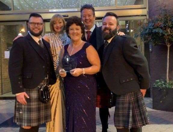 The two teams from Strathspey celebrate in Glasgow. From left to right: James Montgomery, of Firhall House, Lucy Hutchinson from Muckrach Lodge, Prestige Hotel Awards independent judge Audrey Webster, Mark Huntley of Muckrach Lodge and Stuart Ewing from Firhall House.