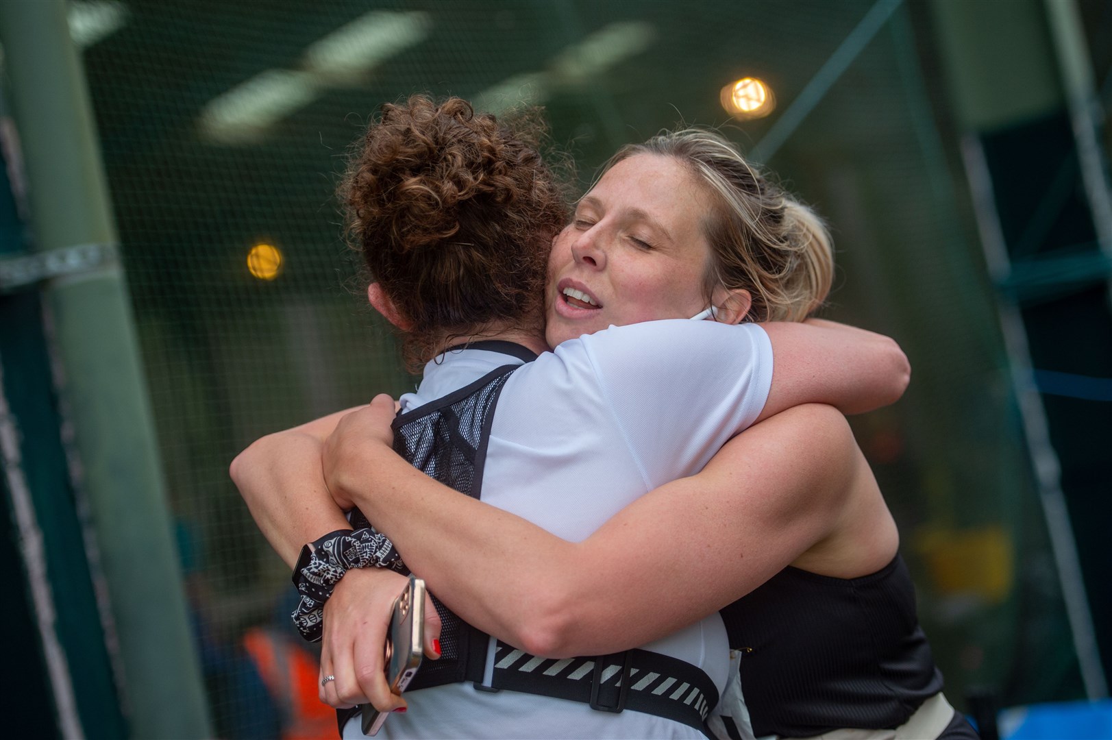 A congratulatory hug at the end. Picture : Callum Mackay.