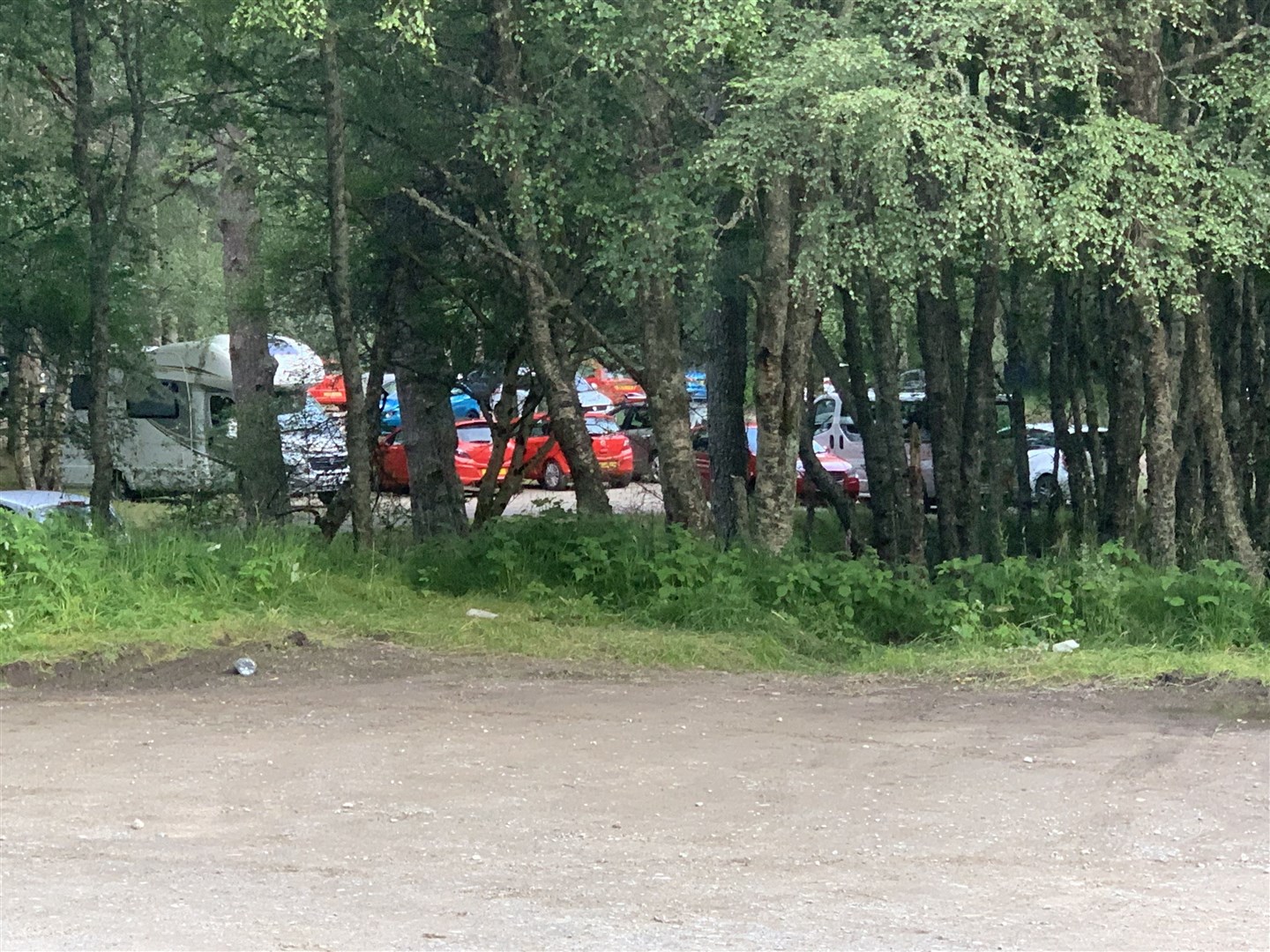 There has been a big rise in uncontrolled camping at Glenmore caused by the end of lockdown and the continuing closure of Glenmore Campsite. Cars parked the previous weekend by Loch Morlich despite a ban on overnight parking.