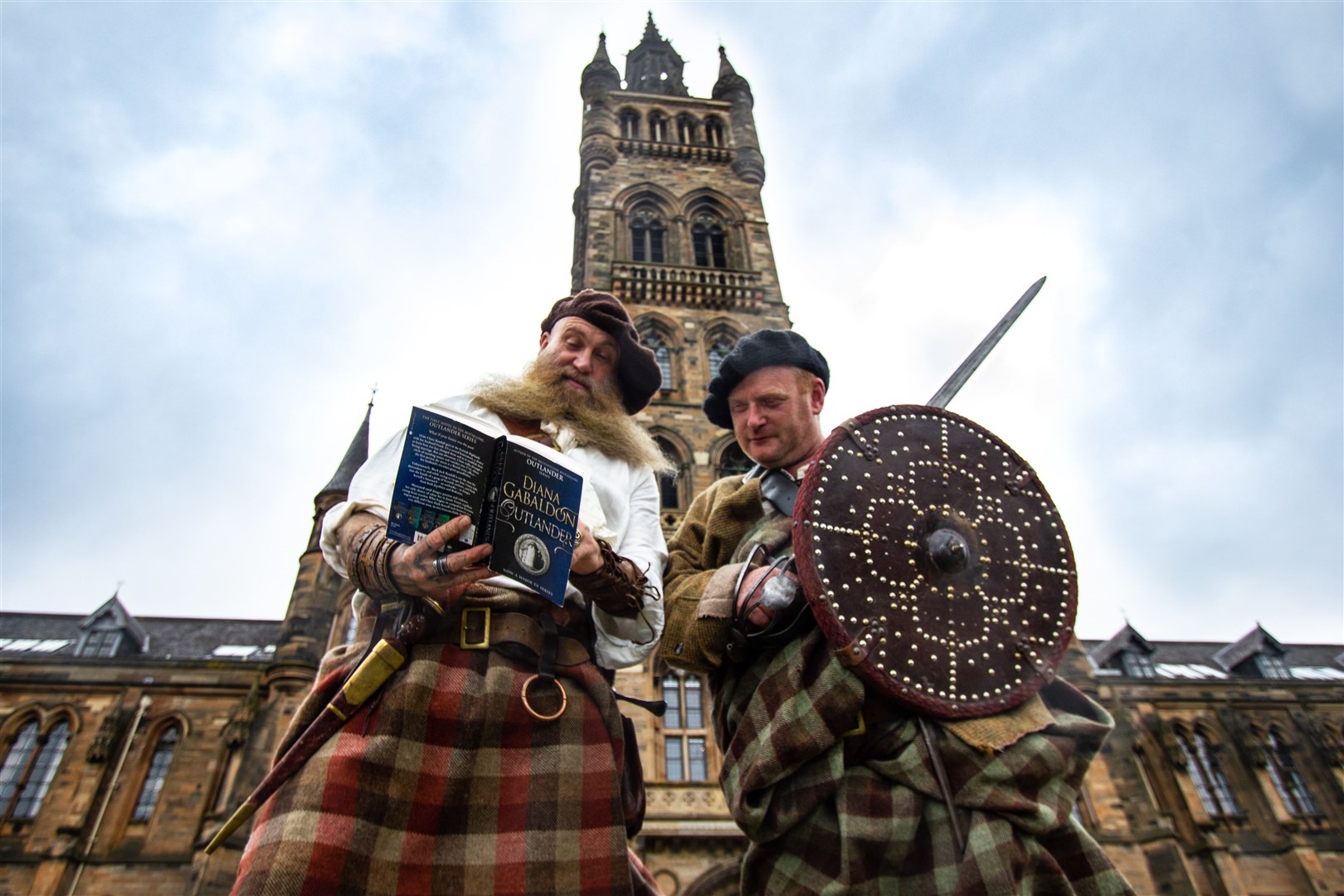 Charlie Allan and Scott McMaster of The Clanranald Trust for Scotland help to launch the Outlander Conference 2020 announcement at the University of Glasgow. Charlie is a fight choreographer and has appeared in the series.