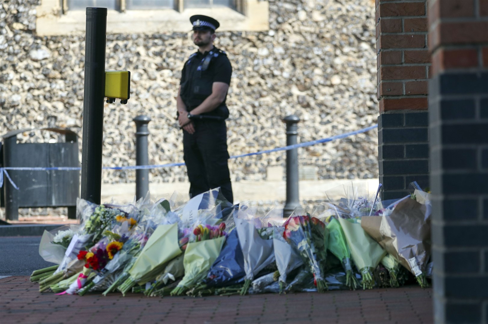Floral tributes are left at Forbury Gardens, Reading, where the attack took place (Steve Parsons/PA)