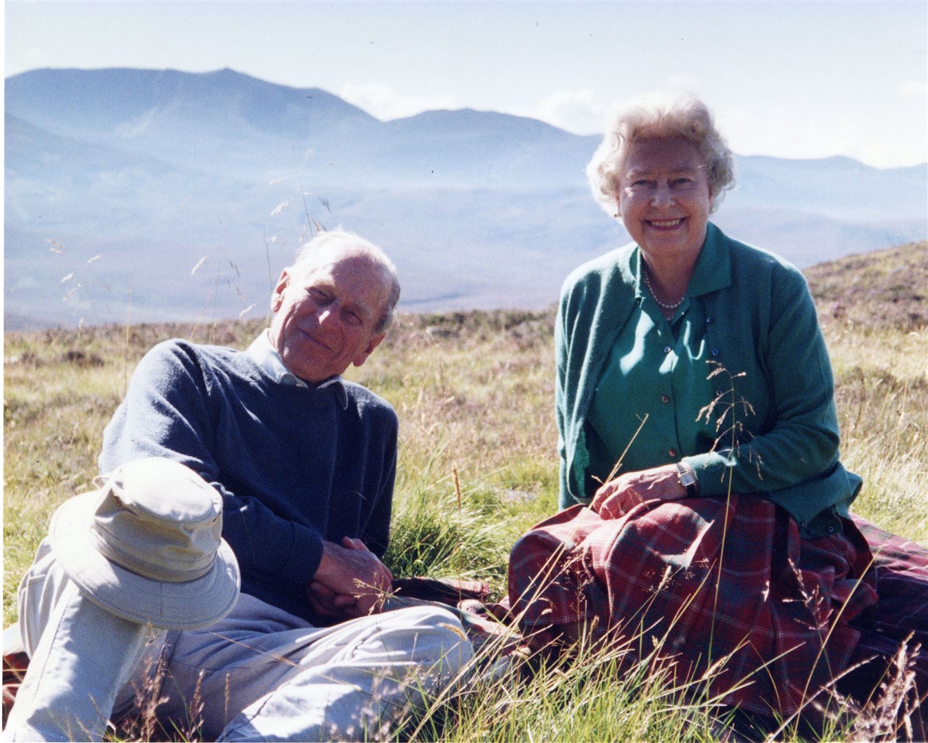 Philip and the Queen relax on the Balmoral estate in 2003 (Countess of Wessex/PA)