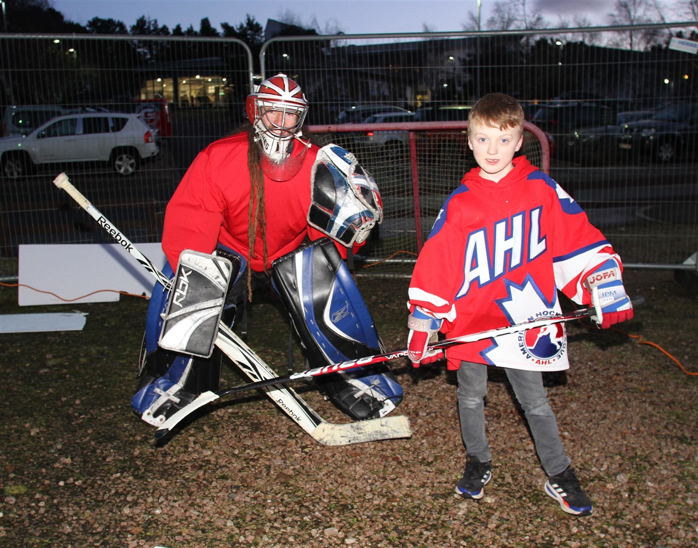Ice hockey keeper Rossco Inglis with Braedan Gallagher Fraser (7) at the recent Winter Chill day which included a beat-the-goalie challenge.