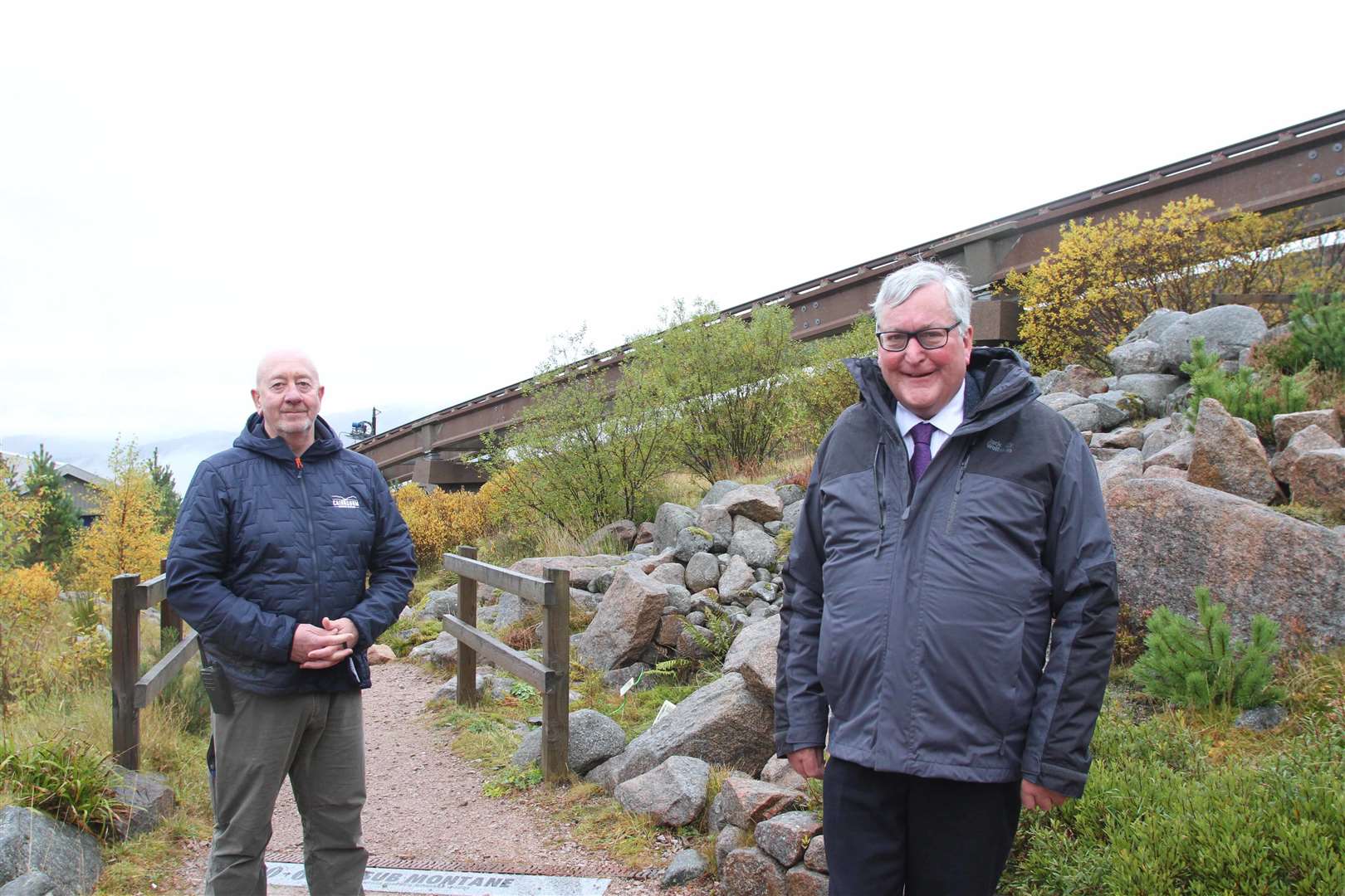 Fergus Ewing on a visit to see the repairs being carried out to the funicular, with Cairngorm Mountain (Scotland) Ltd's operations manager Colin Matthew.