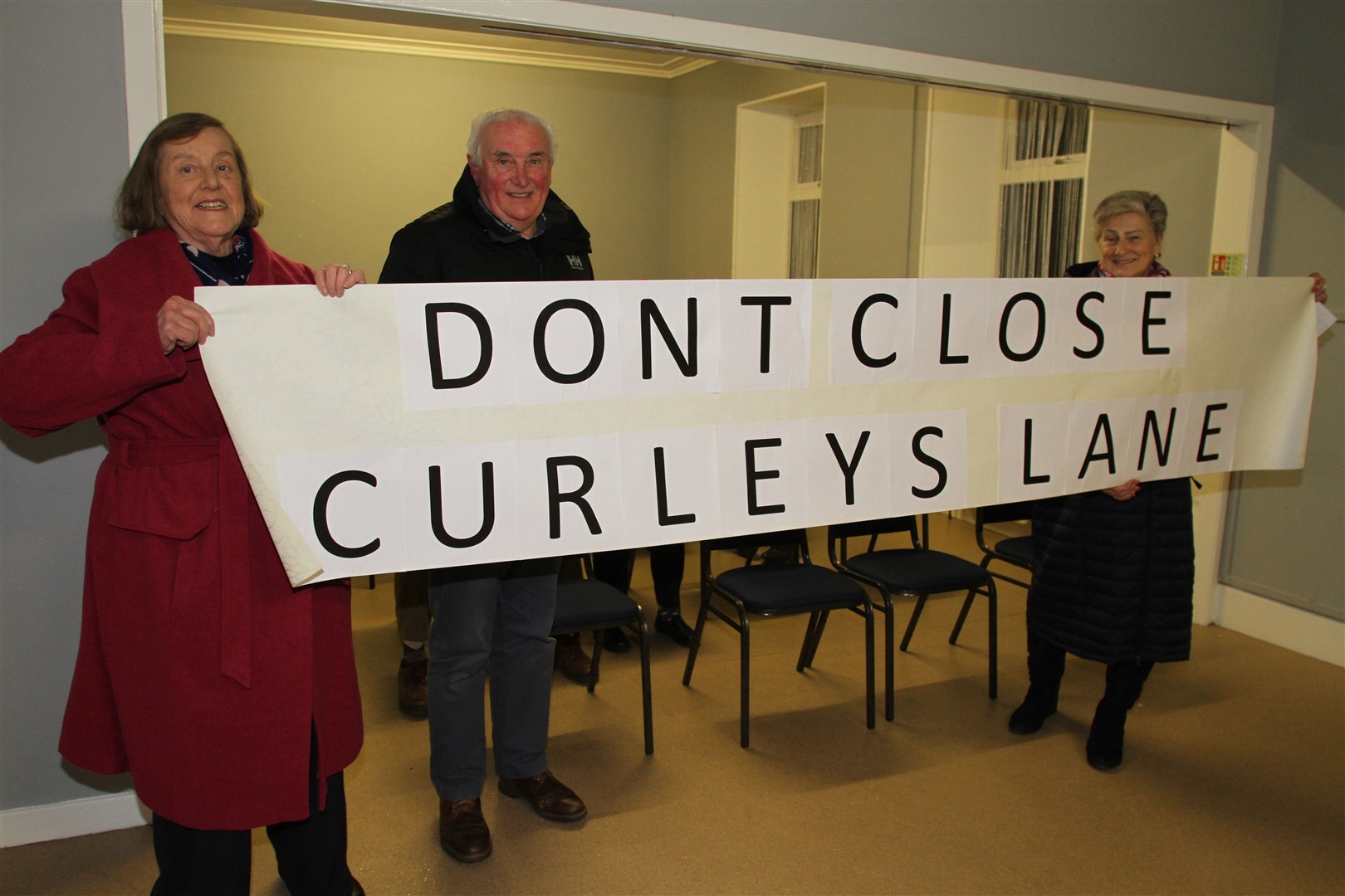 Patsy Rimell, John Mackenzie and Gillian Campbell make their feelings known at the meeting.