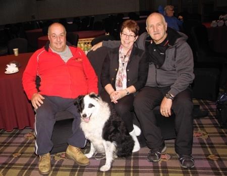 Badger the dog was one of the evacuees cared for at the Aviemore Mountain Resort rescue centre. He's pictured with owner Leslie Hudson (left) and fellow escapees Isobel and Robert Aitken