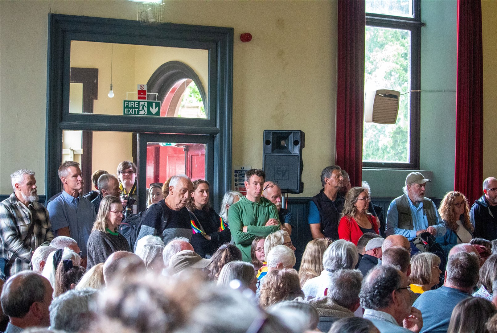 Attendees were forced to take position in the entrance of the hall as it reached capacity. Picture: Niall Harkiss
