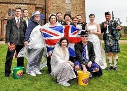 North of Scotland Newspapers staff along with Lord-Lieutenant of Caithness Anne Dunnett and piper John Macrae.