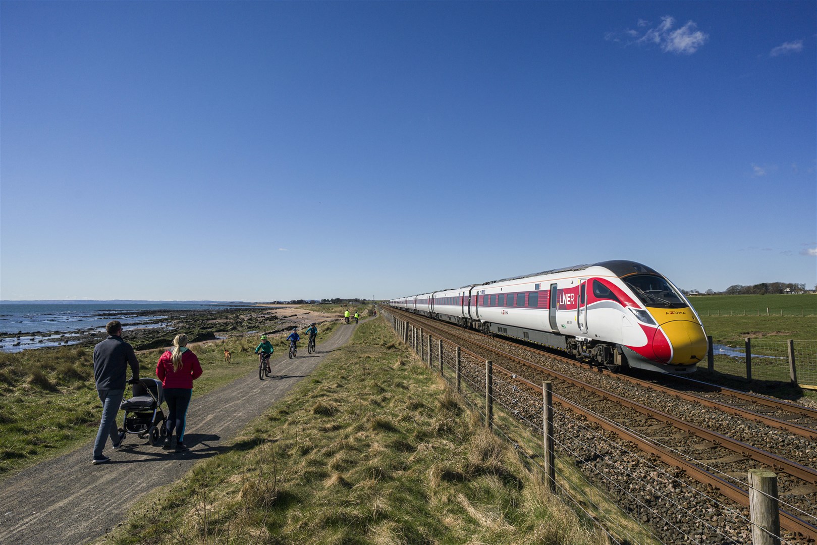 LNER Azuma trains on the East Coast mainline head to Inverness through the strath.