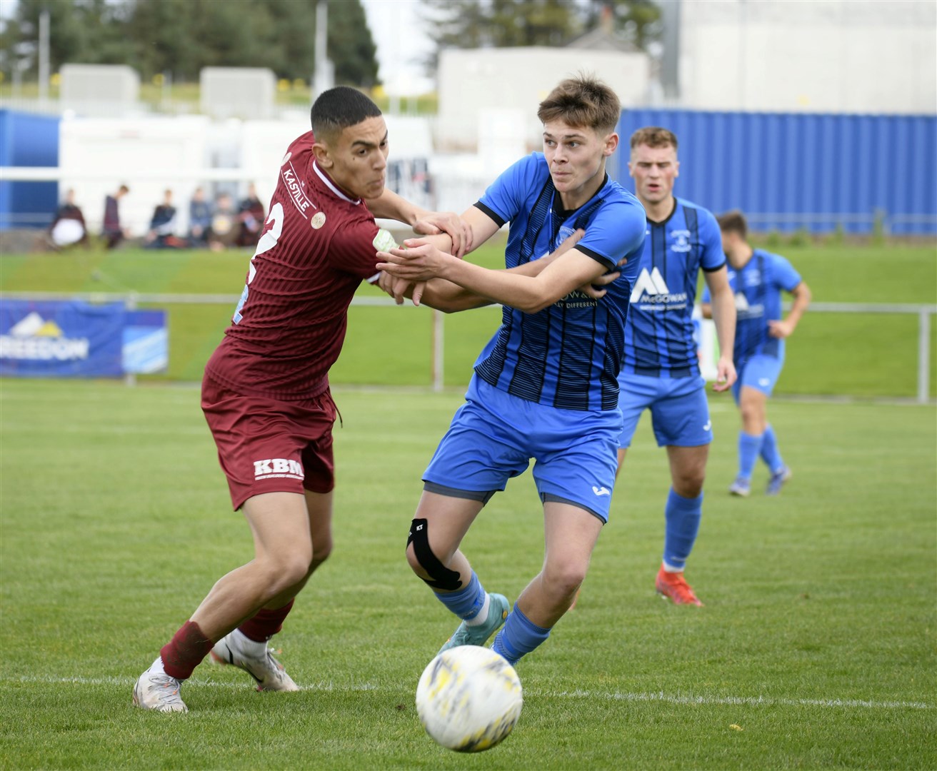 Strathspey scorer Aiden Cruickshank tussles with Keith’s Rhys Thomas. Pic: Beth Taylor