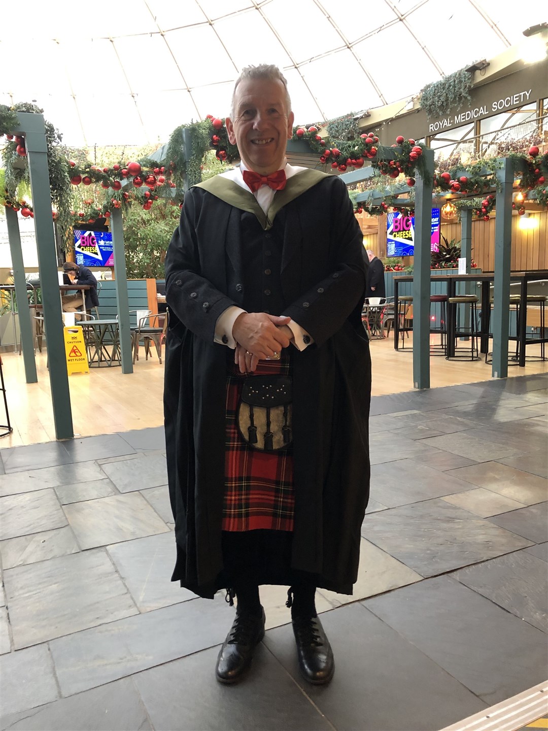 Retired MSP David Stewart won a surprise award after he graduated.