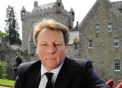 Brett Gubbins takes a breather outside Cawdor Castle.