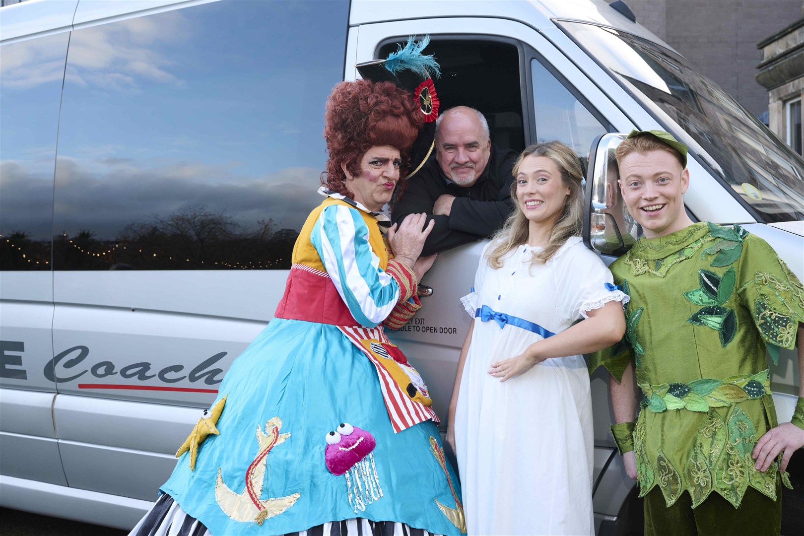 Driver Keiran Canning of panto sponsors D & E Coaches drops off stars, left to right, Steven Wren, Lorenz Michelucci-Dunn and Reece Duncan.