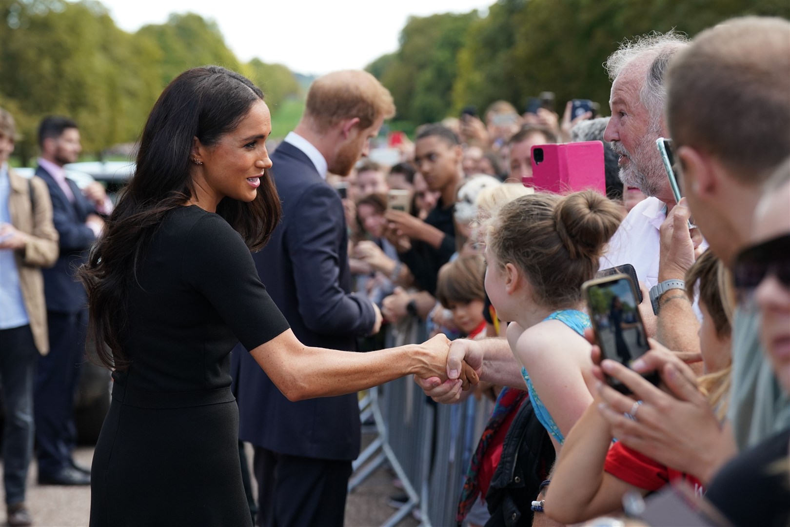 Meghan spent more than 40 minutes with the other royals meeting well-wishers (Kirsty O’Connor/PA)