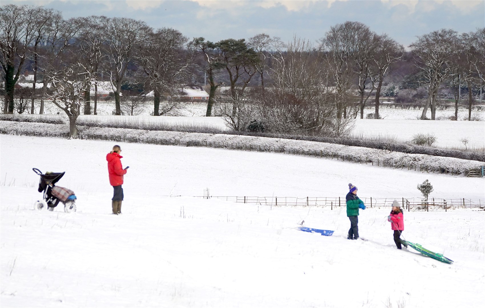 Some in Northumberland took advantage of the snow-covered fields for some outdoor fun (Owen Humphreys/PA)