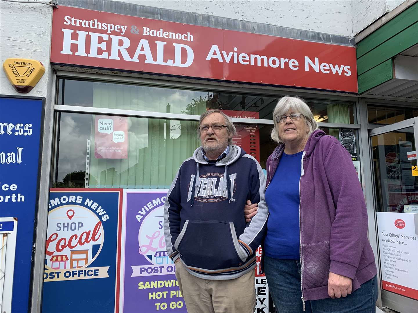 Ernest Kopp and Debra outside of Aviemore News and post office.
