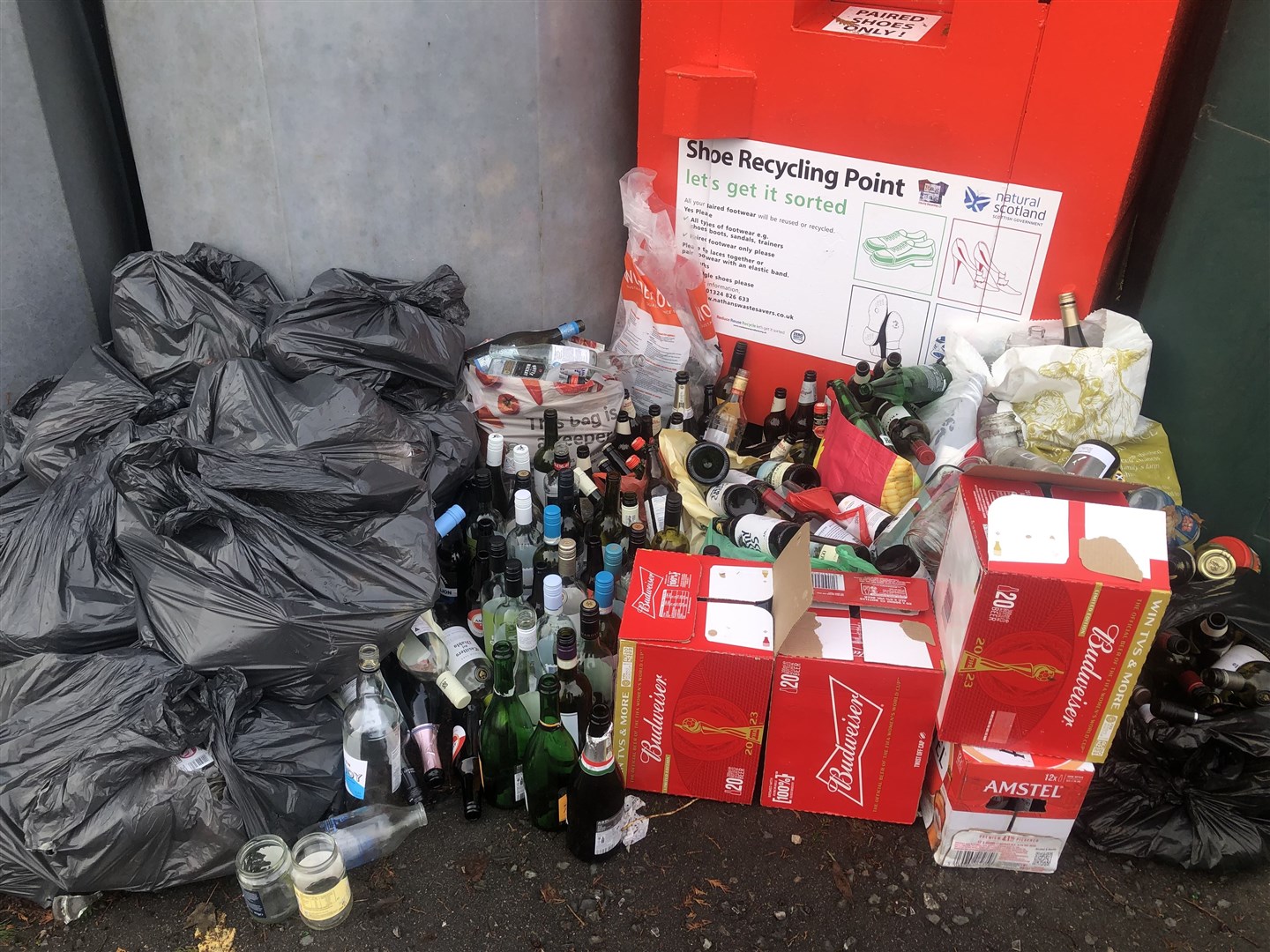 The overflowing bottle bank at Grantown.