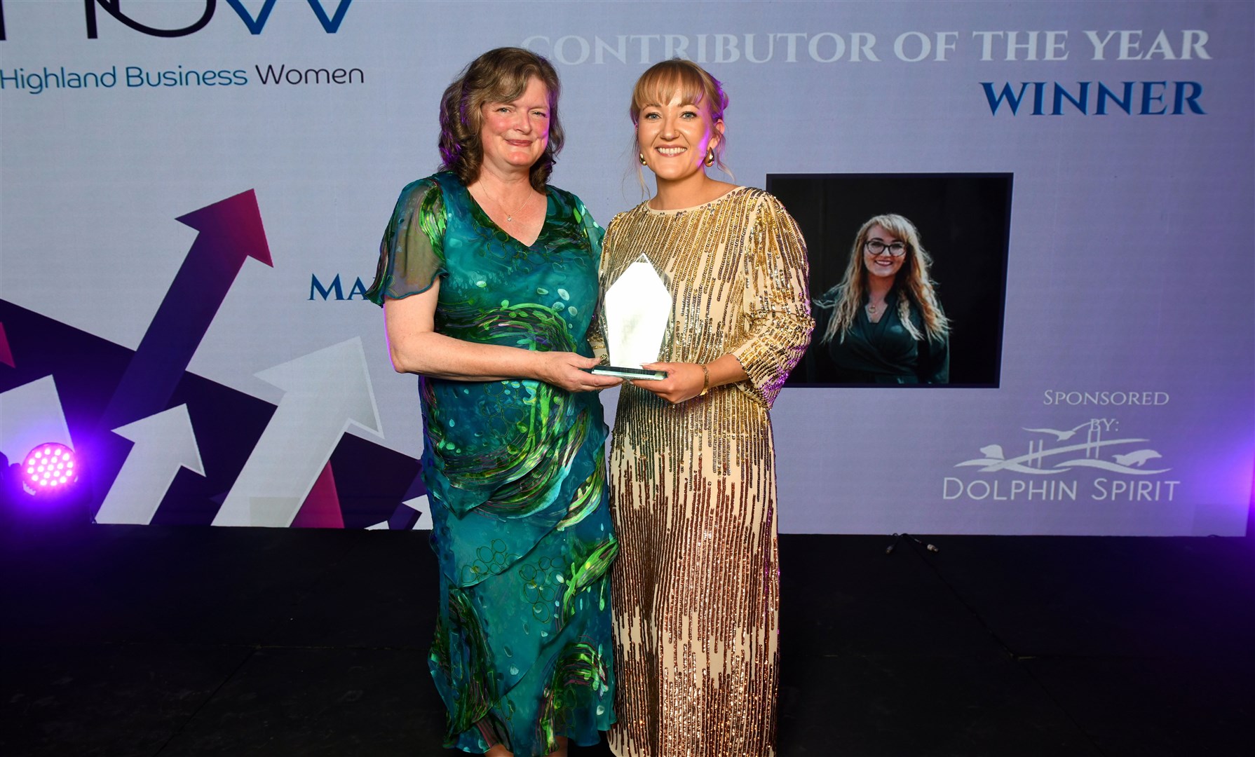 Mairi Macdonald (right) collecting an award.