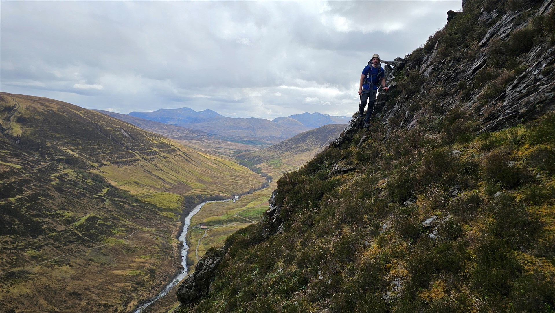 NO SLOPING OFF: Sam demonstrates how tough it could be following the line, no matter the difficulties. 'We'd only walked up hills or down them or round them, never like this, sidey-ways!'