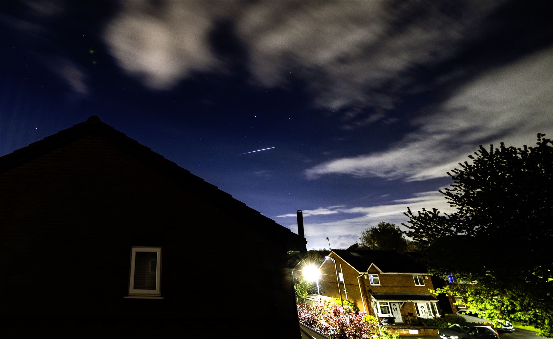 A Lyrid meteor is seen in the sky above Lee Park in Liverpool, Merseyside (Peter Byrne/PA)