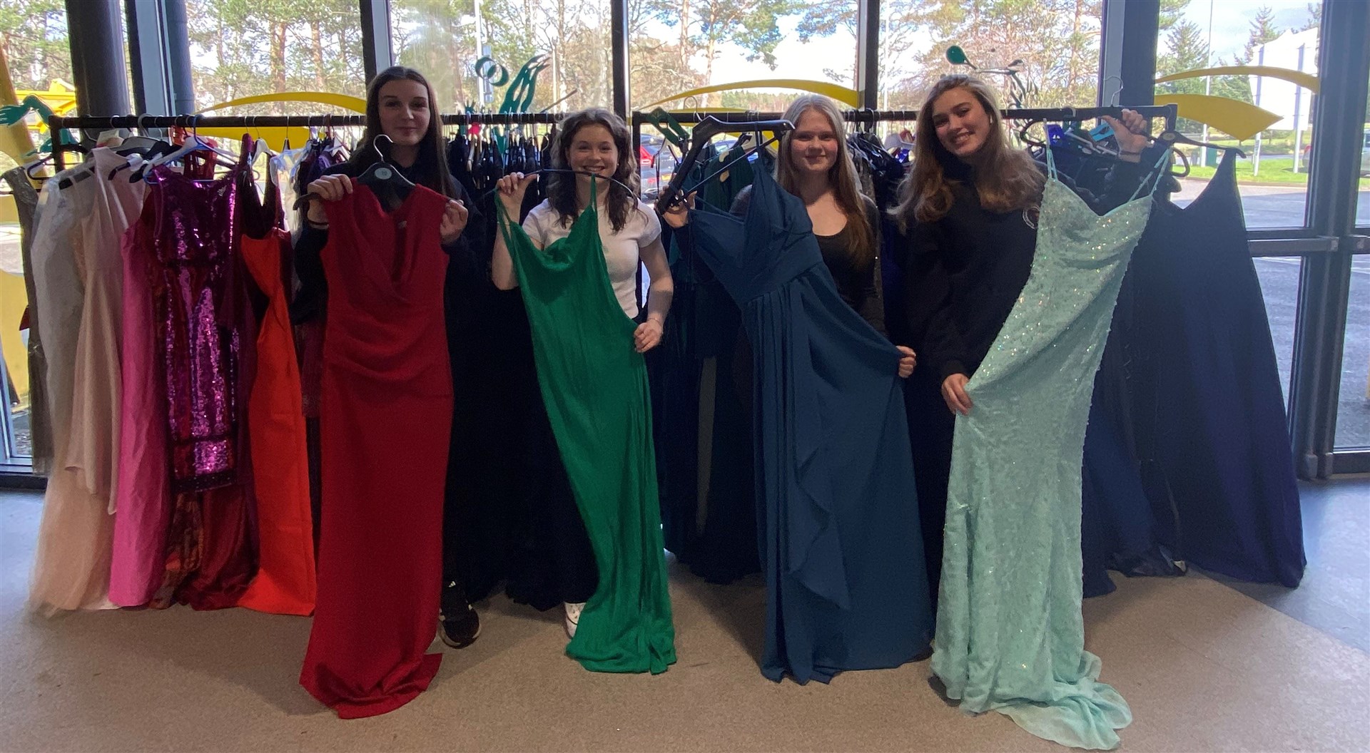 Priscilla Macdonald, Anna Hutt, Jennifer Wilkinson and Rosie Trussell check out some of the prom dresses at the school.