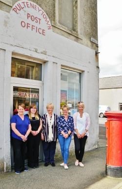 Kathleen Smith with staff from Pulteneytown Post Office in the week it closed its doors for the last time. Picture: David G Scott
