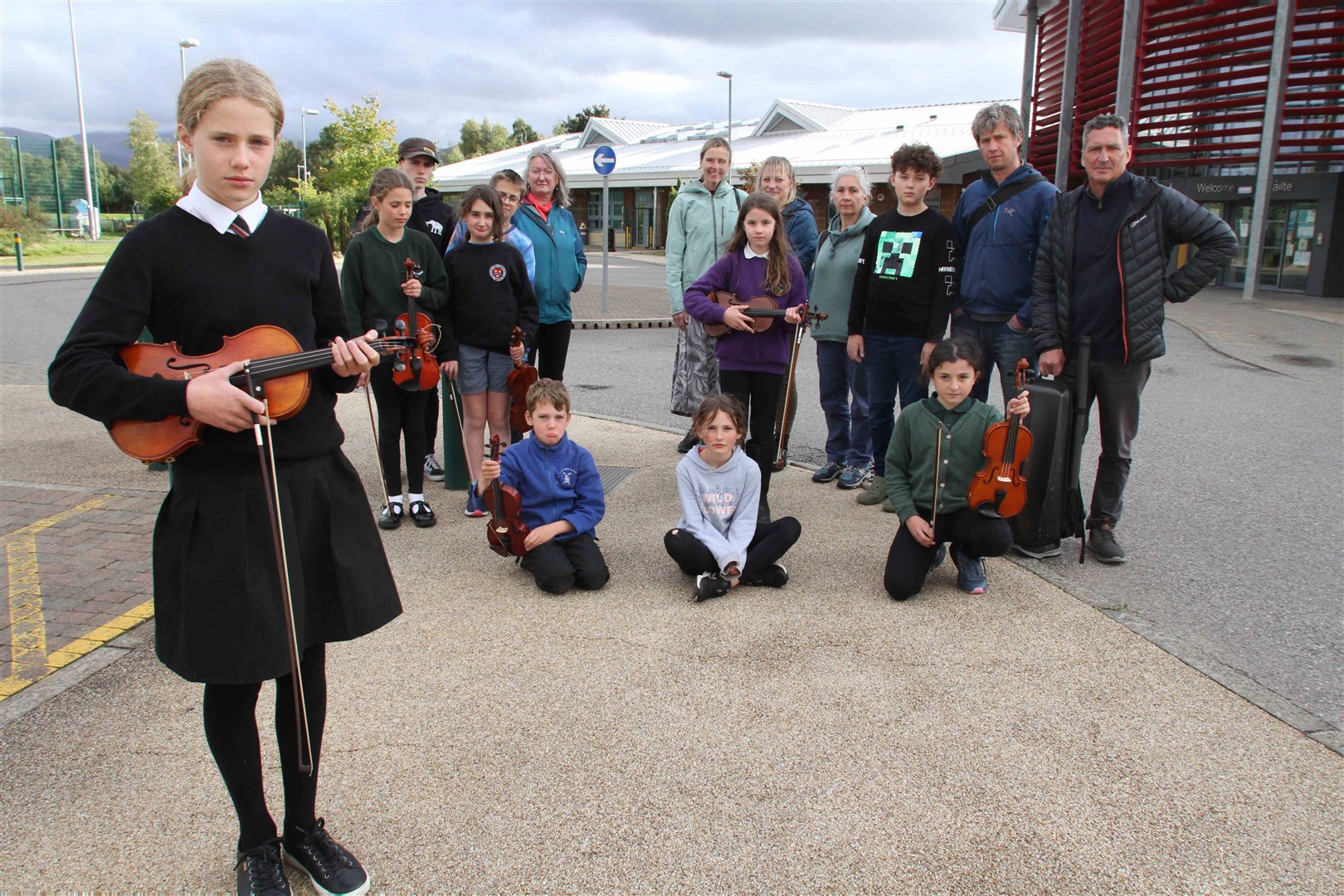 Tutors and pupils outside Aviemore Primary School last week. S1 student Iona Pizarro is in front.