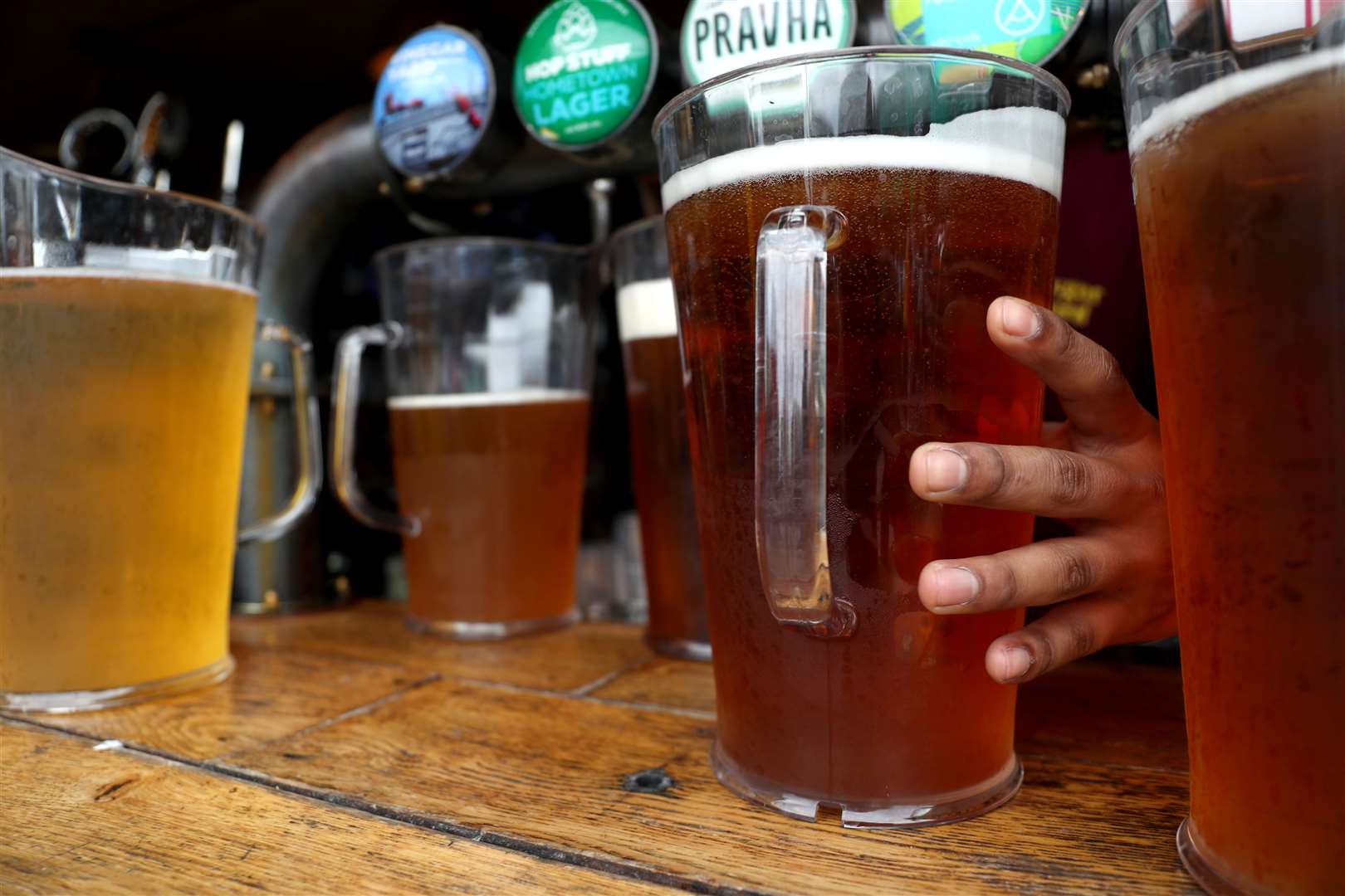 Taxes on draught beer are being cut as part of a huge overhaul of the UK’s alcohol duty system (Kieran Cleeves/PA)