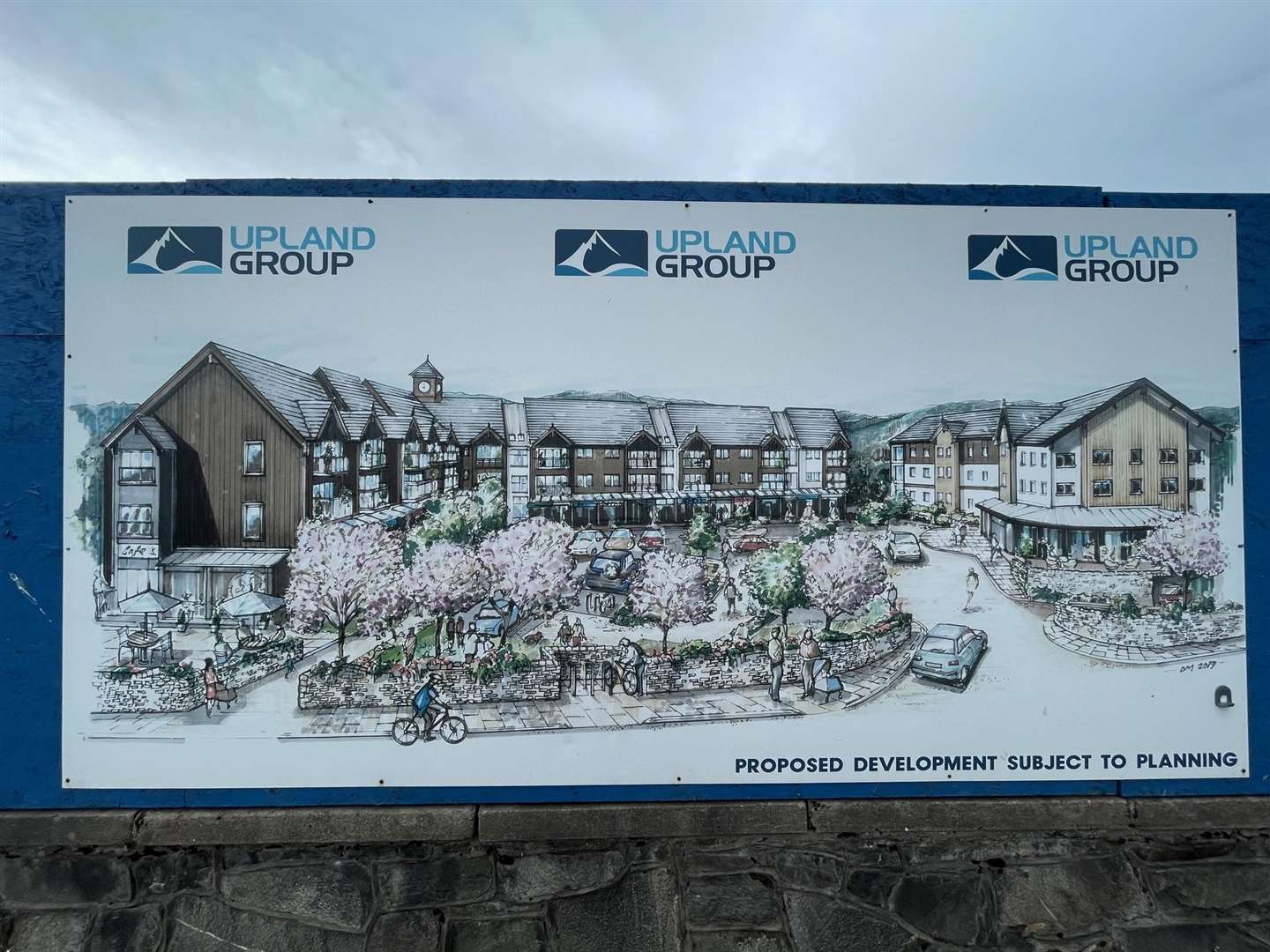 A sign showing off a now revised plan for the development.