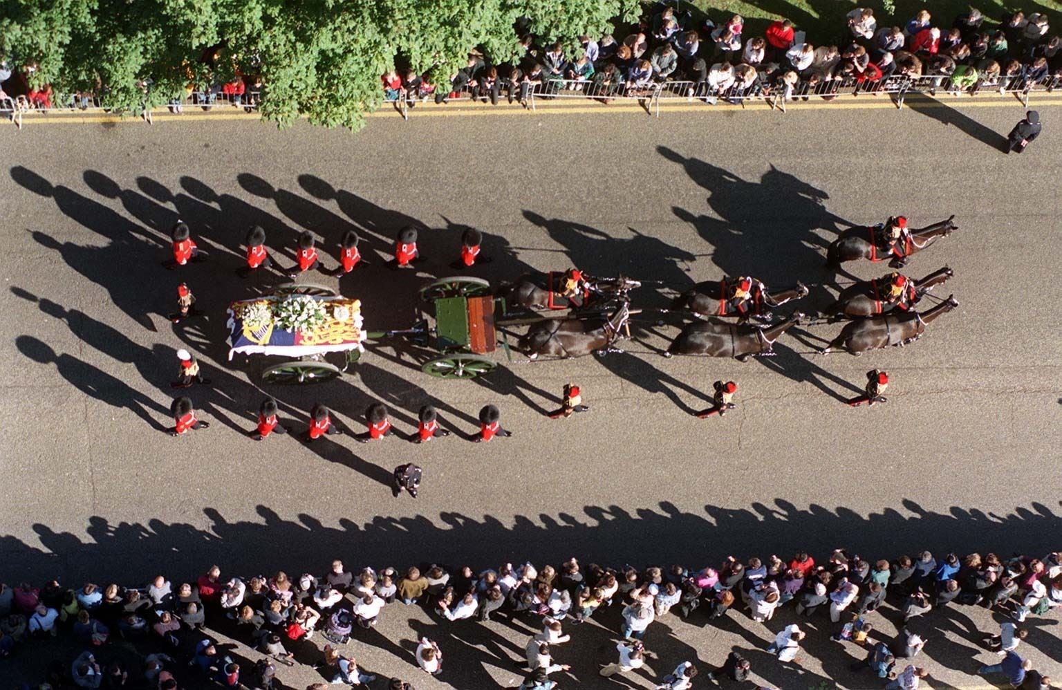 The coffin of Diana, Princess of Wales as the funeral cortege makes its way to Westminster Abbey in 1997 (Neil Munns/PA)
