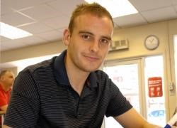 Ross County have signed former ICT captain, Grant Munro