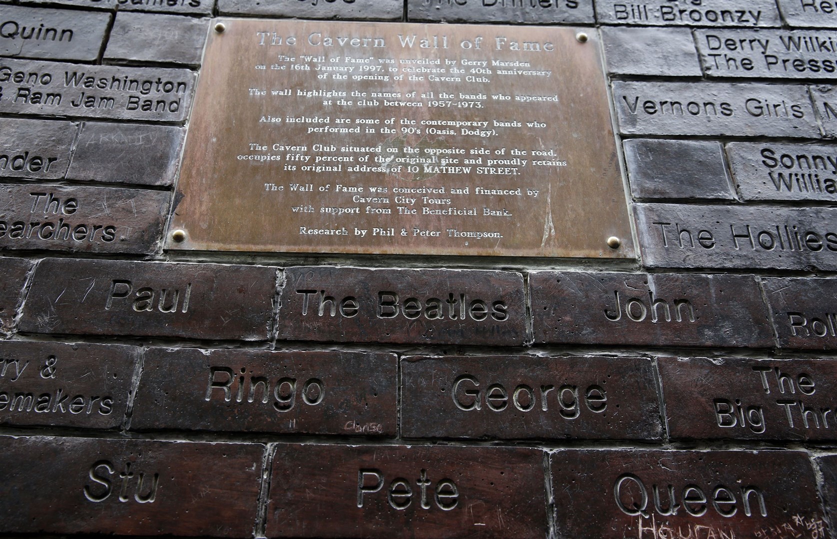 A wall of fame in Mathew Street in Liverpool featuring the names of members of The Beatles and other bands who performed at the Cavern Club (Peter Byrne/PA)