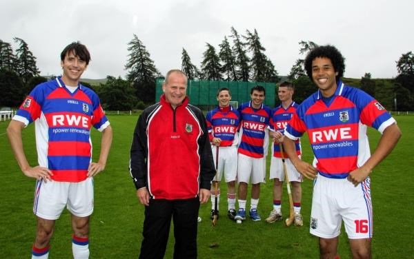Ed (left) and Johnny (right) with Kingussie past president Ali Brown and players Thomas Borthwick, Hamish Anderson and Ryan Borthwick