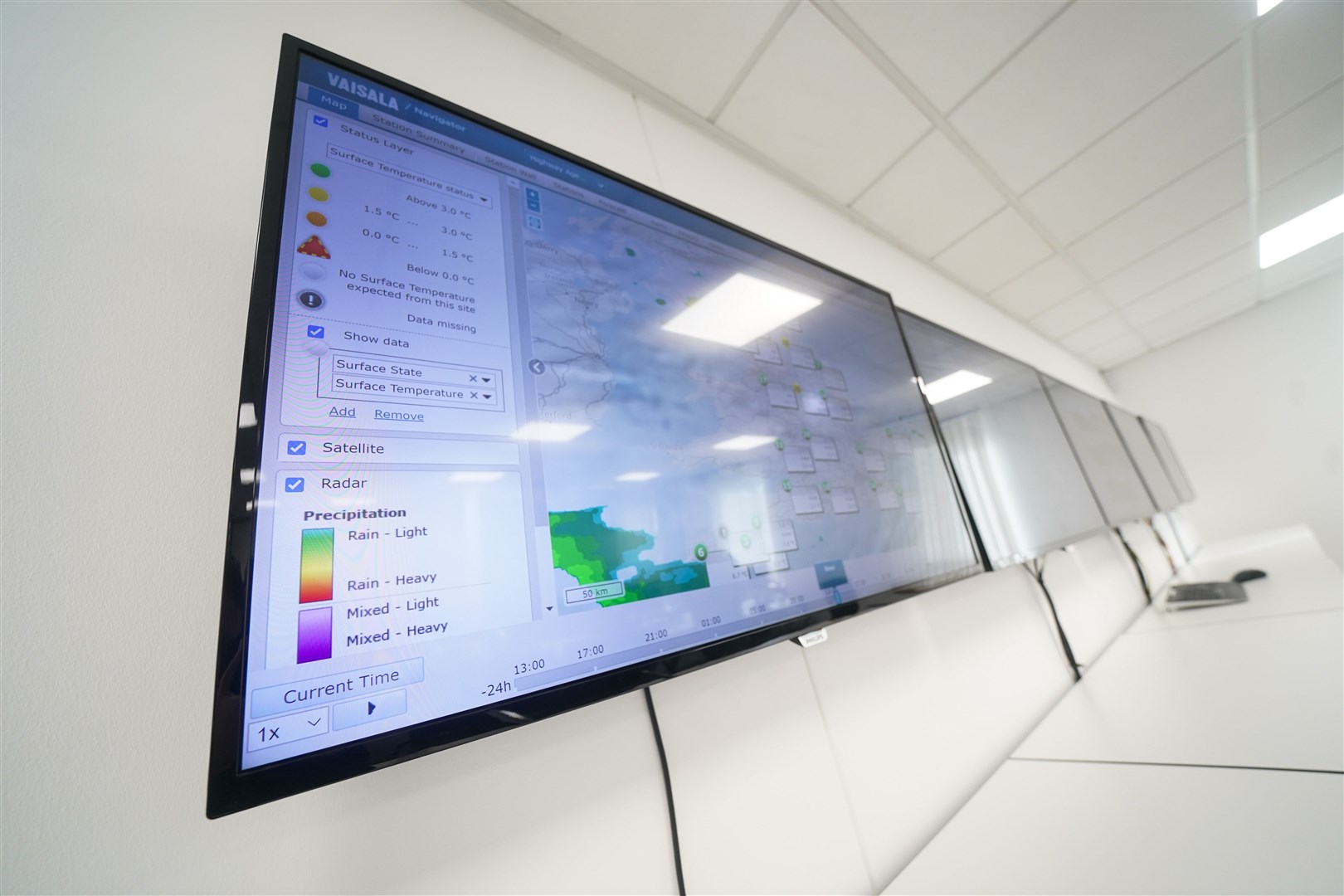 Information screens displaying weather data (Jacob King/PA)