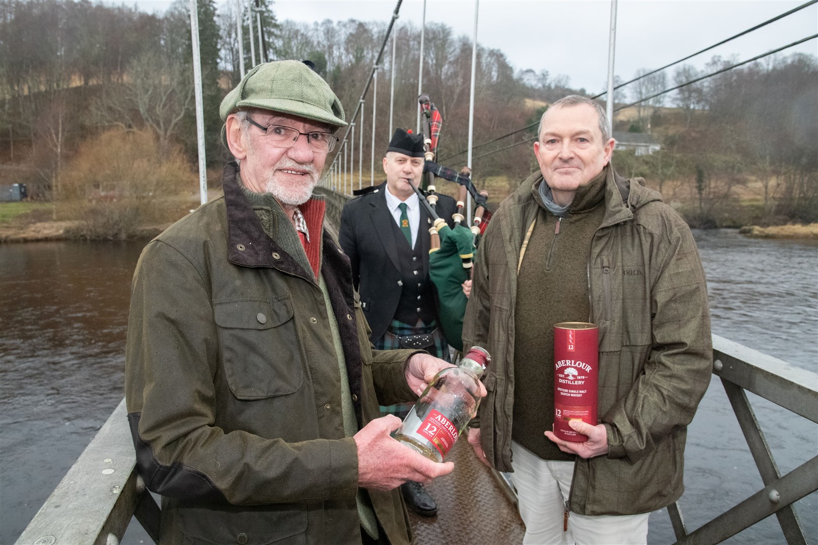 From left: John Anderson (guest of honour), Richard Anderson (piper) and Phil Williams (interim director at the Spey Fishery Board). Picture: Daniel Forsyth.