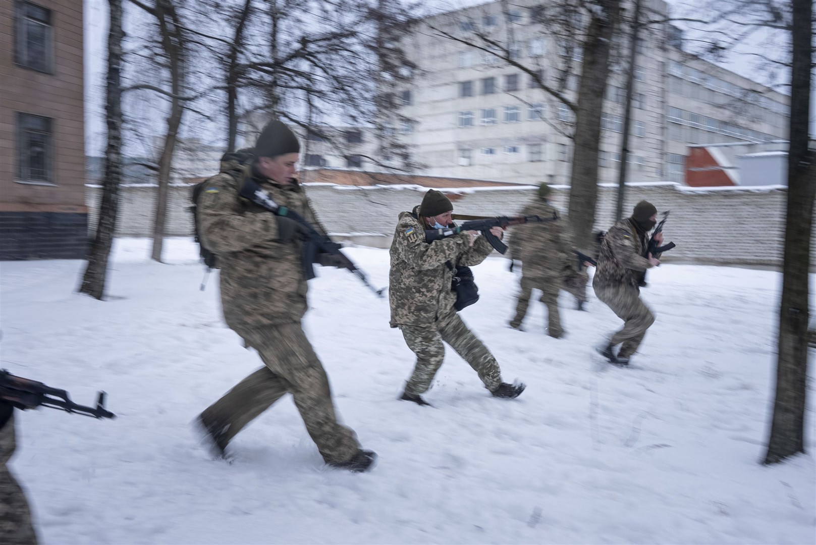 Members of Ukraine’s Territorial Defence Forces, volunteer military units of the armed forces, train in Kharkiv, Ukraine (Evgeniy Maloletka/AP)