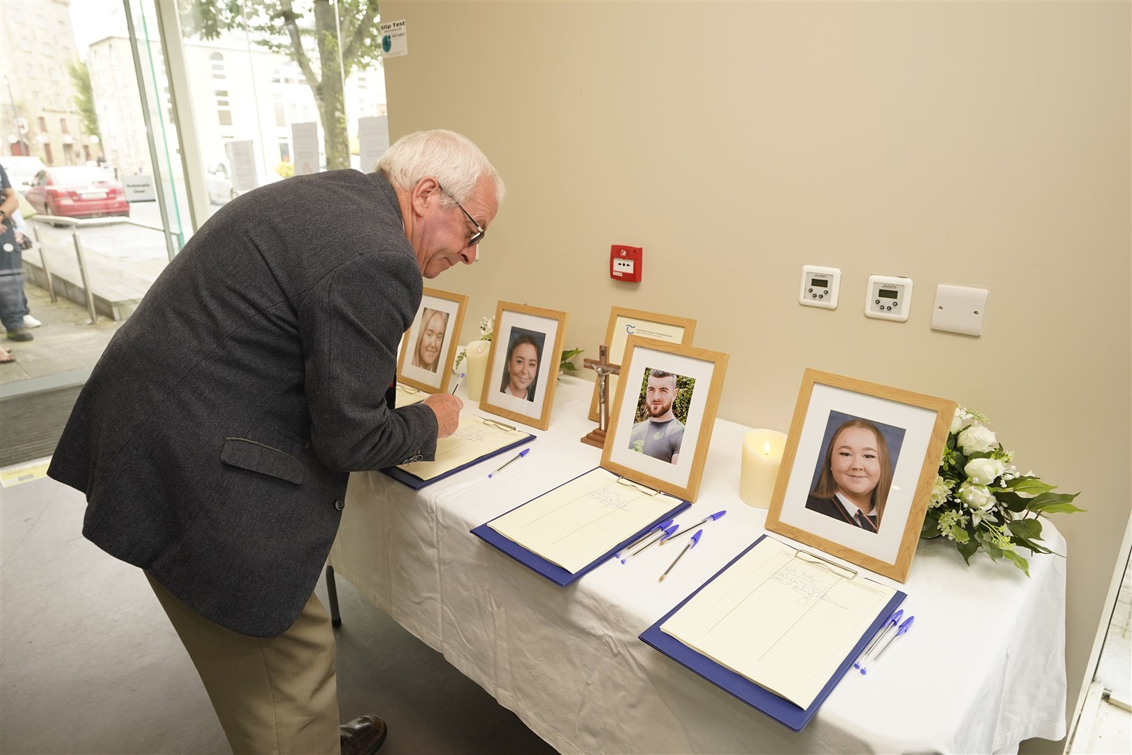 Books of condolence for each of the victims have been signed (Niall Carson/PA)