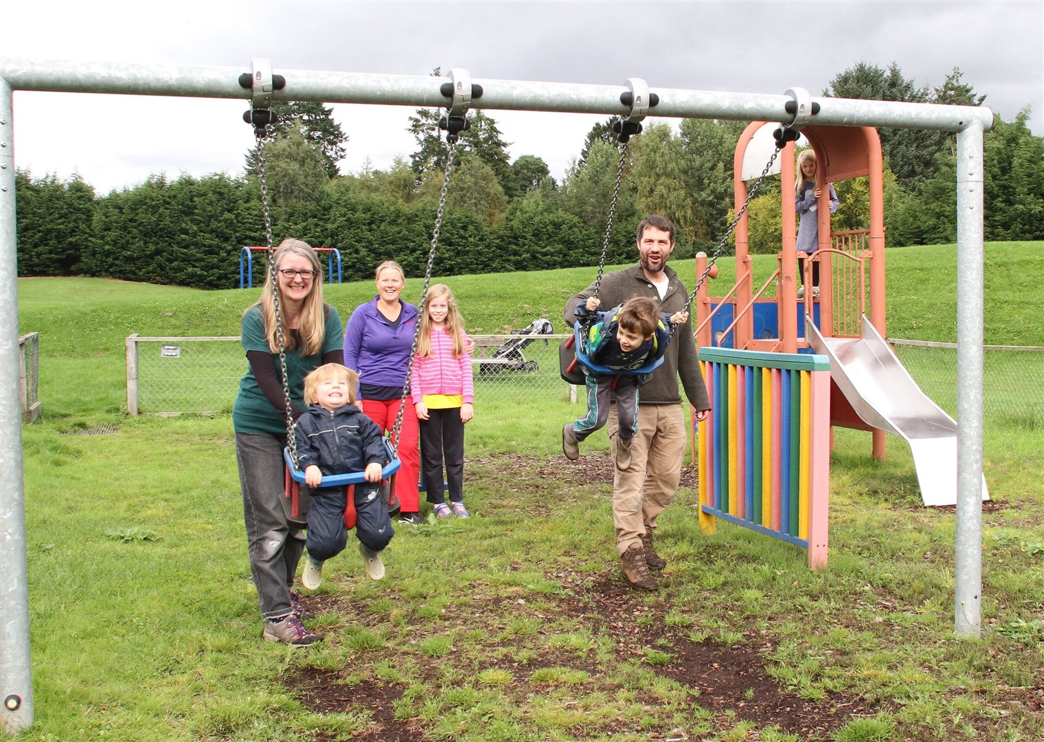 Dulaig play park improvement supporters Jane Candlish and Angus Grant with Drew and Duggie, along with Ingrid Artus and Anna-Lena and Sebastian.