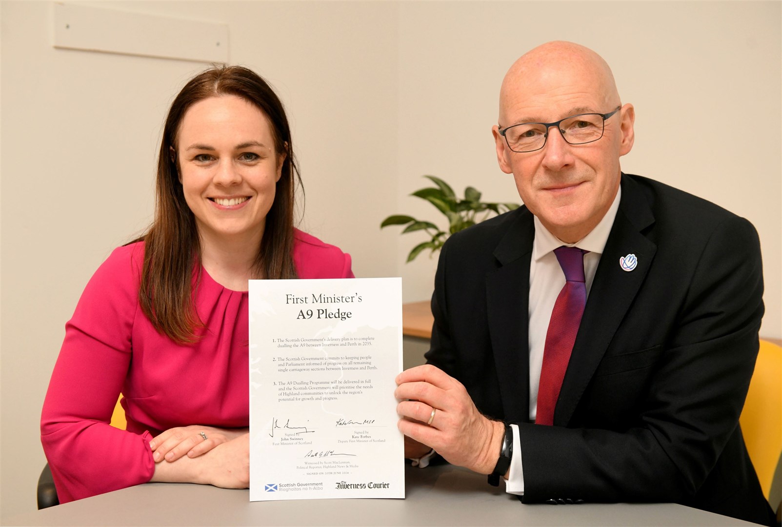 First Minister John Swinney and Deputy First Minister Kate Forbes sign Inverness Courier's A9 Pledge. Picture: James Mackenzie